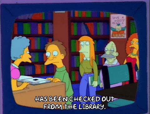 Library Checking Out Books