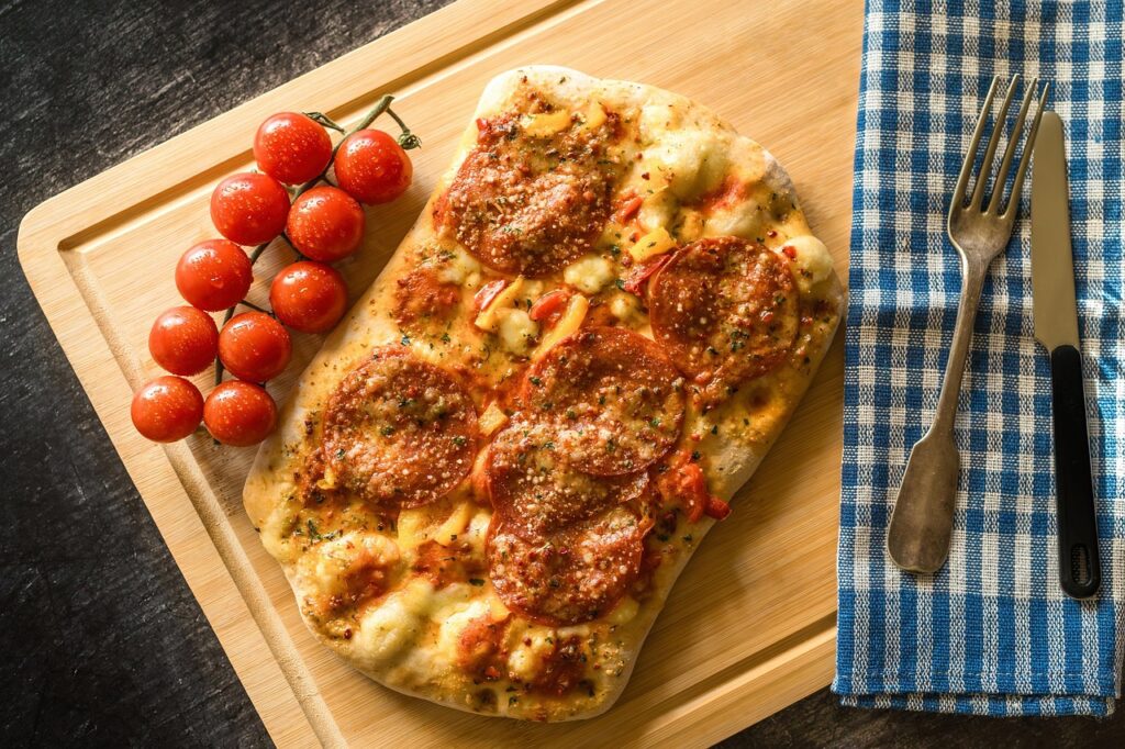 tomatoes, pizza, food, meal, cheese, wooden board, baked, salami, top view, flatlay